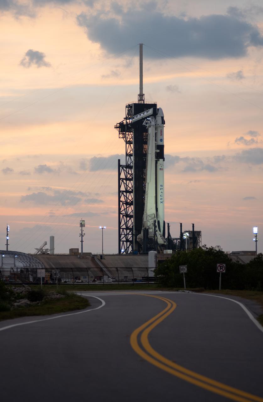 A SpaceX Falcon 9 rocket with the company's Dragon spacecraft on top is seen at sunset on the launch pad at Launch Complex 39A as preparations continue for the Crew-6 mission, Saturday, Feb. 25, 2023, at NASA’s Kennedy Space Center in Florida. NASA’s SpaceX Crew-6 mission is the sixth crew rotation mission of the SpaceX Crew Dragon spacecraft and Falcon 9 rocket to the International Space Station as part of the agency’s Commercial Crew Program. NASA astronauts Stephen Bowen and Warren "Woody" Hoburg, UAE (United Arab Emirates) astronaut Sultan Alneyadi, and Roscosmos cosmonaut Andrey Fedyaev are scheduled to launch at 1:45 a.m. EST on Feb. 27, from Launch Complex 39A at the Kennedy Space Center. Photo Credit: (NASA/Joel Kowsky)