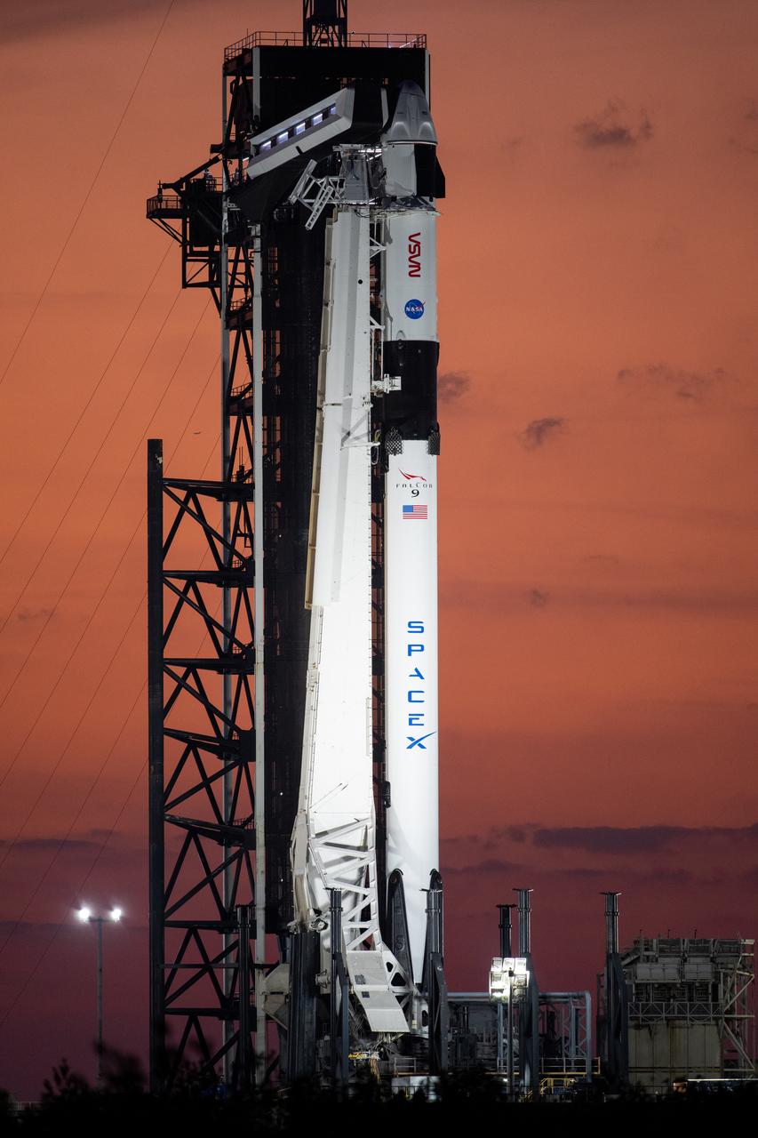 A SpaceX Falcon 9 rocket with the company's Dragon spacecraft on top is seen at sunset on the launch pad at Launch Complex 39A as preparations continue for the Crew-6 mission, Saturday, Feb. 25, 2023, at NASA’s Kennedy Space Center in Florida. NASA’s SpaceX Crew-6 mission is the sixth crew rotation mission of the SpaceX Crew Dragon spacecraft and Falcon 9 rocket to the International Space Station as part of the agency’s Commercial Crew Program. NASA astronauts Stephen Bowen and Warren "Woody" Hoburg, UAE (United Arab Emirates) astronaut Sultan Alneyadi, and Roscosmos cosmonaut Andrey Fedyaev are scheduled to launch at 1:45 a.m. EST on Feb. 27, from Launch Complex 39A at the Kennedy Space Center. Photo Credit: (NASA/Joel Kowsky)