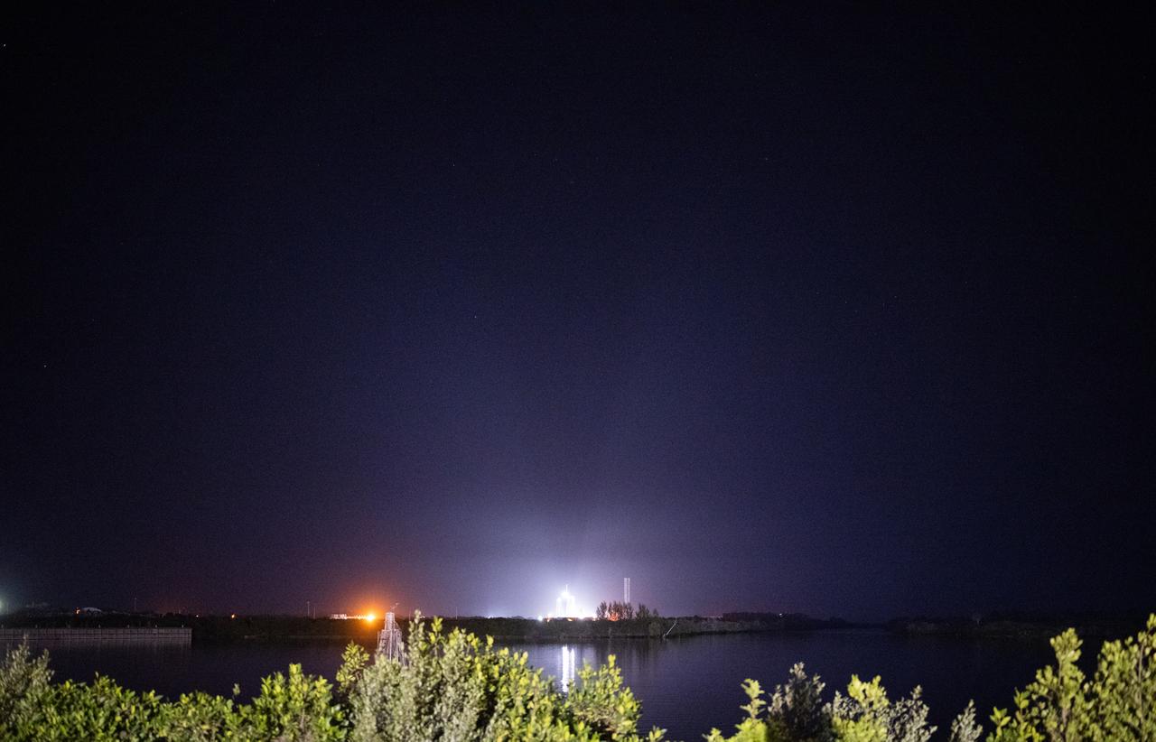 A SpaceX Falcon 9 rocket with the company's Dragon spacecraft on top is seen illuminated by spotlights on the launch pad at Launch Complex 39A as preparations continue for the Crew-6 mission, Sunday, Feb. 26, 2023, at NASA’s Kennedy Space Center in Florida. NASA’s SpaceX Crew-6 mission is the sixth crew rotation mission of the SpaceX Crew Dragon spacecraft and Falcon 9 rocket to the International Space Station as part of the agency’s Commercial Crew Program. NASA astronauts Stephen Bowen and Warren "Woody" Hoburg, UAE (United Arab Emirates) astronaut Sultan Alneyadi, and Roscosmos cosmonaut Andrey Fedyaev are scheduled to launch at 1:45 a.m. EST on Feb. 27, from Launch Complex 39A at the Kennedy Space Center. Photo Credit: (NASA/Joel Kowsky)