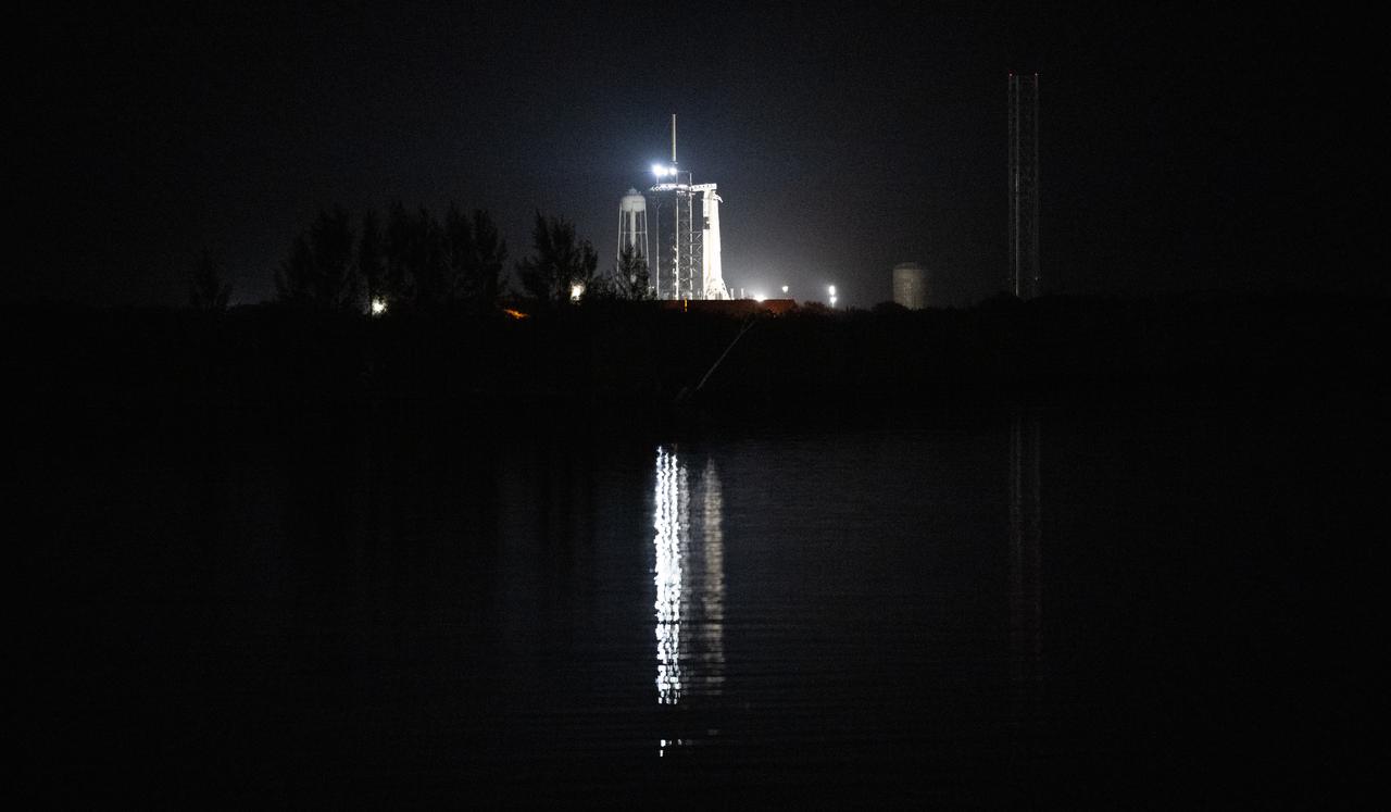 A SpaceX Falcon 9 rocket with the company's Dragon spacecraft on top is seen illuminated by spotlights on the launch pad at Launch Complex 39A as preparations continue for the Crew-6 mission, Sunday, Feb. 26, 2023, at NASA’s Kennedy Space Center in Florida. NASA’s SpaceX Crew-6 mission is the sixth crew rotation mission of the SpaceX Crew Dragon spacecraft and Falcon 9 rocket to the International Space Station as part of the agency’s Commercial Crew Program. NASA astronauts Stephen Bowen and Warren "Woody" Hoburg, UAE (United Arab Emirates) astronaut Sultan Alneyadi, and Roscosmos cosmonaut Andrey Fedyaev are scheduled to launch at 1:45 a.m. EST on Feb. 27, from Launch Complex 39A at the Kennedy Space Center. Photo Credit: (NASA/Joel Kowsky)