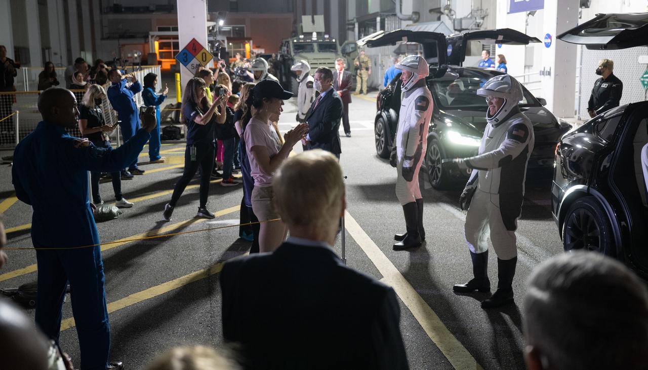 NASA astronauts Stephen Bowen, right, and Warren "Woody" Hoburg, second from right, Roscosmos cosmonaut Andrey Fedyaev, second from left, and UAE (United Arab Emirates) astronaut Sultan Alneyadi, left, wearing SpaceX spacesuits, are seen as they prepare to depart the Neil A. Armstrong Operations and Checkout Building for Launch Complex 39A to board the SpaceX Dragon spacecraft for the Crew-6 mission launch, Sunday, Feb. 26, 2023, at NASA’s Kennedy Space Center in Florida. NASA’s SpaceX Crew-6 mission is the sixth crew rotation mission of the SpaceX Crew Dragon spacecraft and Falcon 9 rocket to the International Space Station as part of the agency’s Commercial Crew Program. Bowen, Hoburg, Alneyadi, and Fedyaev are scheduled to launch at 1:45 a.m. EST on Feb. 27, from Launch Complex 39A at the Kennedy Space Center. Photo Credit: (NASA/Joel Kowsky)