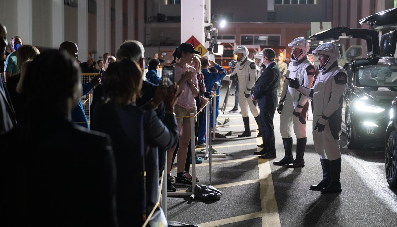 NASA astronauts Stephen Bowen, right, and Warren "Woody" Hoburg, second from right, Roscosmos cosmonaut Andrey Fedyaev, second from left, and UAE (United Arab Emirates) astronaut Sultan Alneyadi, left, wearing SpaceX spacesuits, are seen as they prepare to depart the Neil A. Armstrong Operations and Checkout Building for Launch Complex 39A to board the SpaceX Dragon spacecraft for the Crew-6 mission launch, Sunday, Feb. 26, 2023, at NASA’s Kennedy Space Center in Florida. NASA’s SpaceX Crew-6 mission is the sixth crew rotation mission of the SpaceX Crew Dragon spacecraft and Falcon 9 rocket to the International Space Station as part of the agency’s Commercial Crew Program. Bowen, Hoburg, Alneyadi, and Fedyaev are scheduled to launch at 1:45 a.m. EST on Feb. 27, from Launch Complex 39A at the Kennedy Space Center. Photo Credit: (NASA/Joel Kowsky)