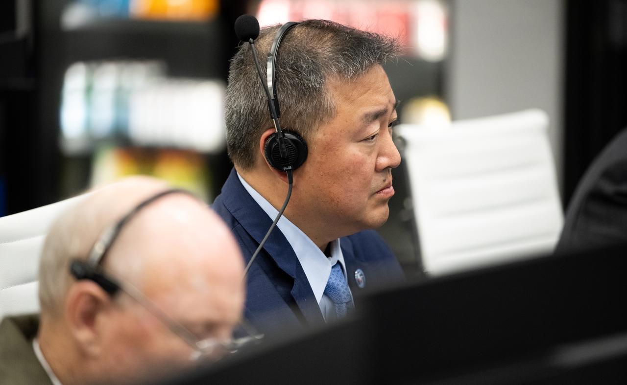Ven Feng, deputy program manager for NASA's Commercial Crew Program, monitors the countdown of the attempted launch of a SpaceX Falcon 9 rocket carrying the company's Dragon spacecraft on NASA’s SpaceX Crew-6 mission with NASA astronauts Stephen Bowen and Warren "Woody" Hoburg, UAE (United Arab Emirates) astronaut Sultan Alneyadi, and Roscosmos cosmonaut Andrey Fedyaev onboard, Monday, Feb. 27, 2023, in firing room four of the Launch Control Center at NASA’s Kennedy Space Center in Florida. NASA’s SpaceX Crew-6 mission is the  sixth crew rotation mission of the SpaceX Dragon spacecraft and Falcon 9 rocket to the International Space Station as part of the agency’s Commercial Crew Program. Today’s launch attempt was scrubbed due to an issue with ground systems. The next launch attempt is targeted for 12:34am ET on Thursday, March 2. Photo Credit: (NASA/Joel Kowsky)