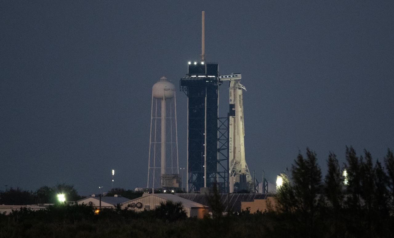 A SpaceX Falcon 9 rocket with the company's Dragon spacecraft on top is seen on the launch pad at Launch Complex 39A as preparations continue for the Crew-6 mission, Wednesday, March 1, 2023, at NASA’s Kennedy Space Center in Florida. NASA’s SpaceX Crew-6 mission is the sixth crew rotation mission of the SpaceX Crew Dragon spacecraft and Falcon 9 rocket to the International Space Station as part of the agency’s Commercial Crew Program. NASA astronauts Stephen Bowen and Warren "Woody" Hoburg, UAE (United Arab Emirates) astronaut Sultan Alneyadi, and Roscosmos cosmonaut Andrey Fedyaev are scheduled to launch at 12:34 a.m. EST on March 2, from Launch Complex 39A at the Kennedy Space Center. Photo Credit: (NASA/Joel Kowsky)