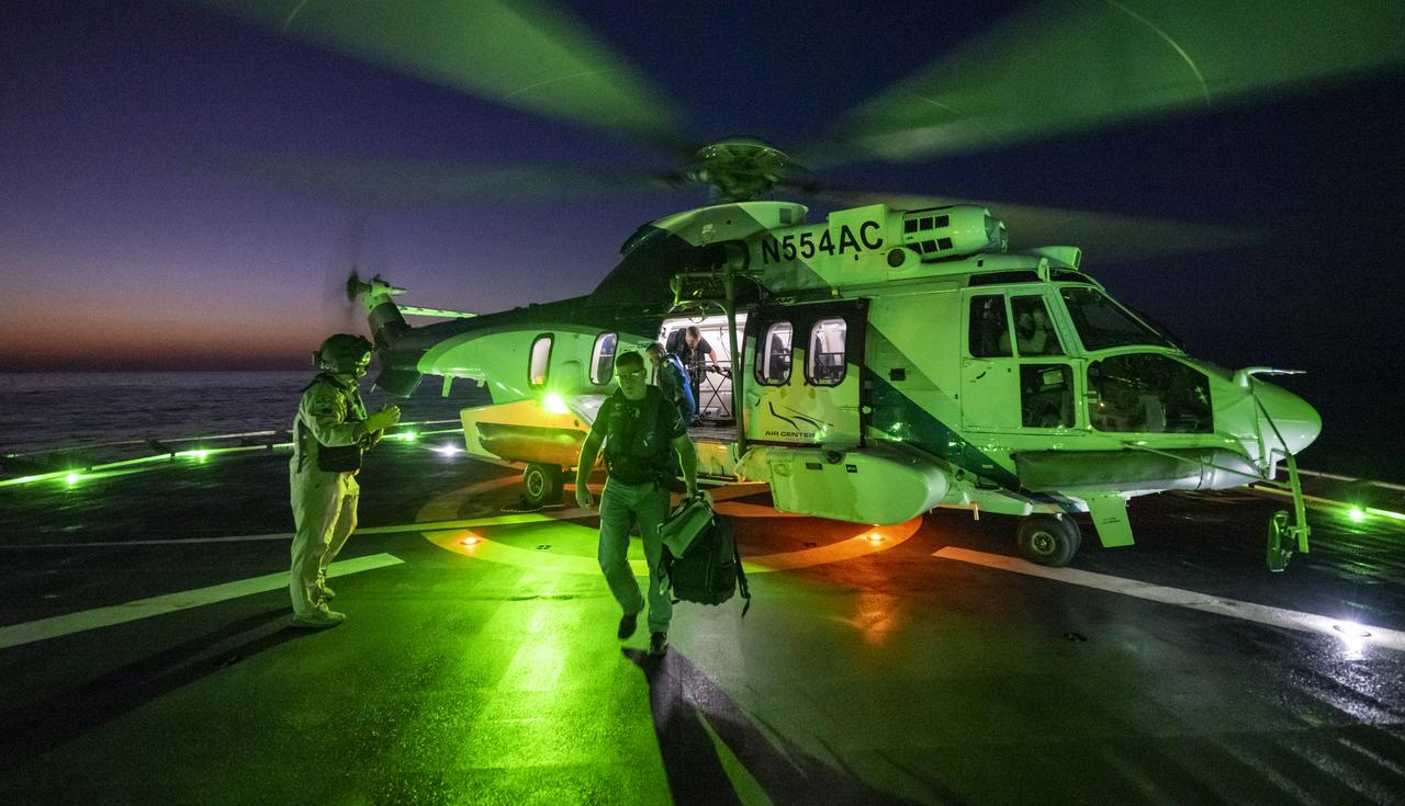 Support teams arrive via helicopter to the SpaceX recovery ship Shannon to prepare for the landing of the SpaceX Dragon Endurance spacecraft with NASA astronauts Nicole Mann and Josh Cassada, Japan Aerospace Exploration Agency (JAXA) astronaut Koichi Wakata, and Roscosmos cosmonaut Anna Kikina onboard in the Gulf of Mexico off the coast of Tampa, Florida, Saturday, March 11, 2023. Mann, Cassada, Wakata, and Kikina are returning after 157 days in space as part of Expedition 68 aboard the International Space Station. Photo Credit: (NASA/Keegan Barber).