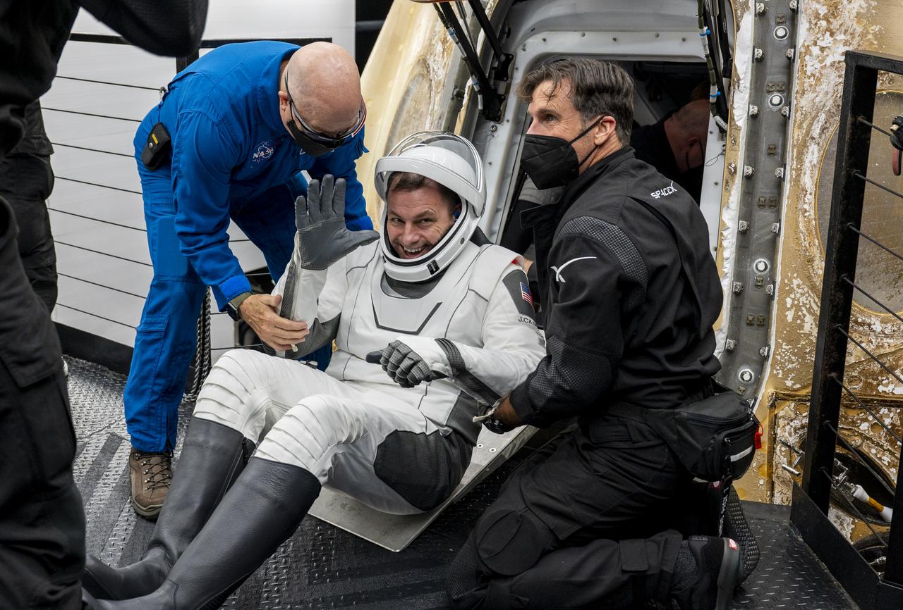 NASA Astronaut Josh Cassada waves after being helped out of the SpaceX Dragon Endurance spacecraft onboard the SpaceX recovery ship Shannon shortly after he, along with NASA astronaut Nicole Mann, Roscosmos cosmonaut Anna Kikina, and Japan Aerospace Exploration Agency (JAXA) astronaut Koichi Wakata, landed in the Gulf of Mexico off the coast of Tampa, Florida, Saturday, March 11, 2023. Mann, Cassada, Wakata, and Kikina are returning after 157 days in space as part of Expedition 68 aboard the International Space Station. Photo Credit: (NASA/Keegan Barber).