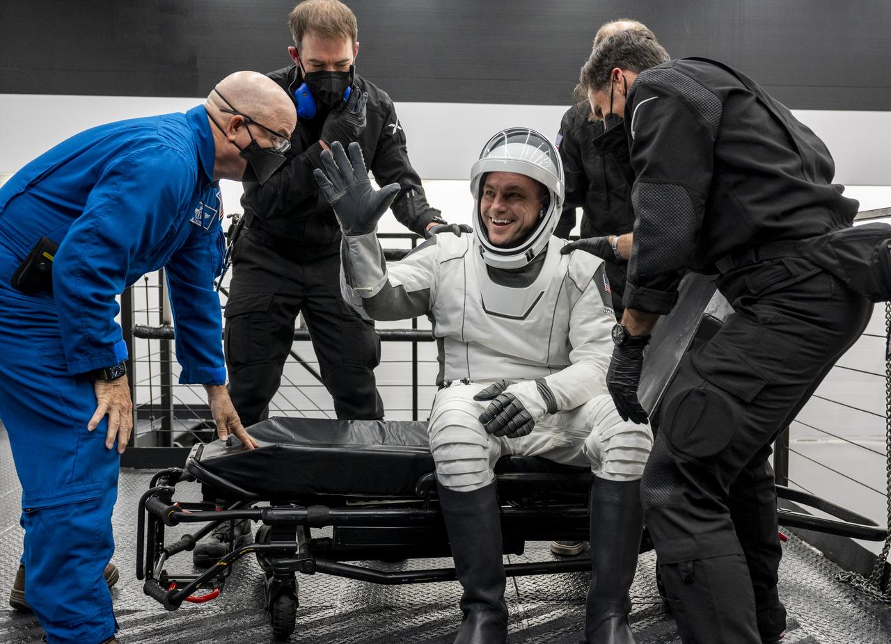 NASA Astronaut Josh Cassada waves after being helped out of the SpaceX Dragon Endurance spacecraft onboard the SpaceX recovery ship Shannon shortly after he, along with NASA astronaut Nicole Mann, Roscosmos cosmonaut Anna Kikina, and Japan Aerospace Exploration Agency (JAXA) astronaut Koichi Wakata, landed in the Gulf of Mexico off the coast of Tampa, Florida, Saturday, March 11, 2023. Mann, Cassada, Wakata, and Kikina are returning after 157 days in space as part of Expedition 68 aboard the International Space Station. Photo Credit: (NASA/Keegan Barber).