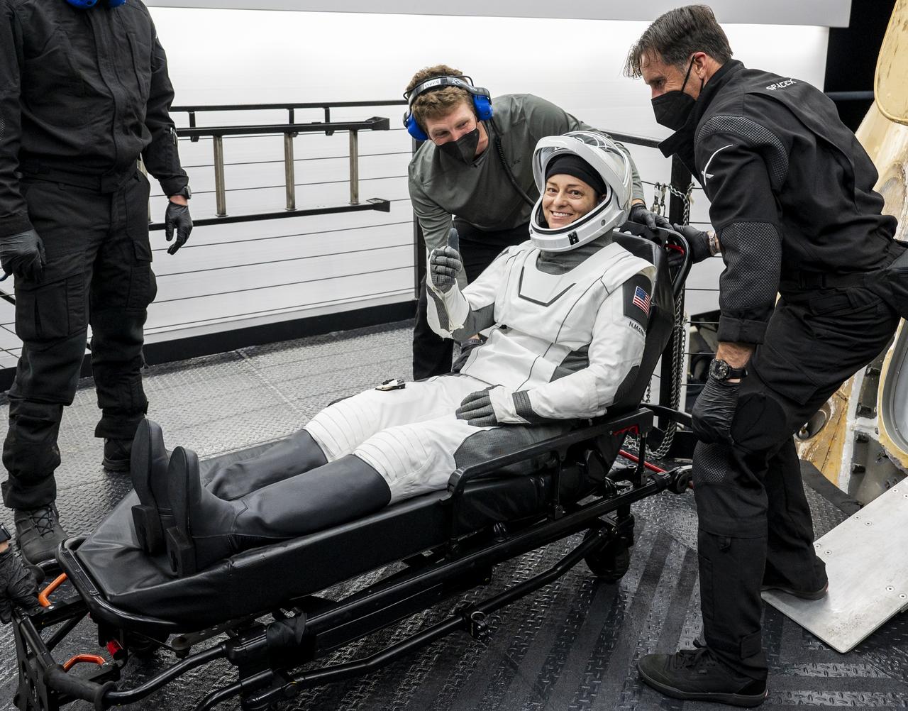 NASA Astronaut Nicole Mann gives a thumbs up after being helped out of the SpaceX Dragon Endurance spacecraft onboard the SpaceX recovery ship Shannon shortly after she, along with NASA astronaut Josh Cassada, Roscosmos cosmonaut Anna Kikina, and Japan Aerospace Exploration Agency (JAXA) astronaut Koichi Wakata, landed in the Gulf of Mexico off the coast of Tampa, Florida, Saturday, March 11, 2023. Mann, Cassada, Wakata, and Kikina are returning after 157 days in space as part of Expedition 68 aboard the International Space Station. Photo Credit: (NASA/Keegan Barber).