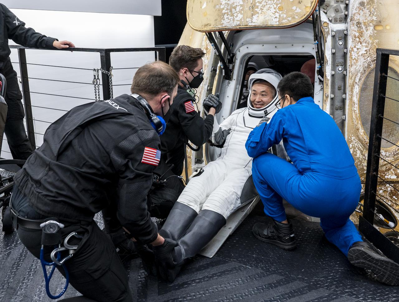 Japan Aerospace Exploration Agency (JAXA) astronaut Koichi Wakata is helped out of the SpaceX Dragon Endurance spacecraft onboard the SpaceX recovery ship Shannon shortly after he, along with NASA astronauts Nicole Mann, Josh Cassada, and Roscosmos cosmonaut Anna Kikina, landed in the Gulf of Mexico off the coast of Tampa, Florida, Saturday, March 11, 2023. Mann, Cassada, Wakata, and Kikina are returning after 157 days in space as part of Expedition 68 aboard the International Space Station. Photo Credit: (NASA/Keegan Barber).