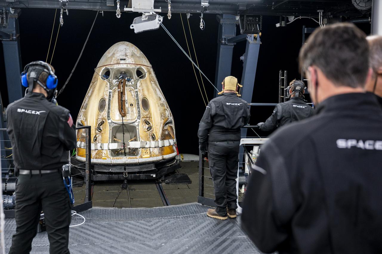 Support teams onboard the SpaceX recovery ship Shannon work around the SpaceX Dragon Endurance spacecraft shortly after it landed with  with NASA astronauts Nicole Mann and Josh Cassada, Japan Aerospace Exploration Agency (JAXA) astronaut Koichi Wakata, and Roscosmos cosmonaut Anna Kikina onboard in the Gulf of Mexico off the coast of Tampa, Florida, Saturday, March 11, 2023. Mann, Cassada, Wakata, and Kikina are returning after 157 days in space as part of Expedition 68 aboard the International Space Station. Photo Credit: (NASA/Keegan Barber).