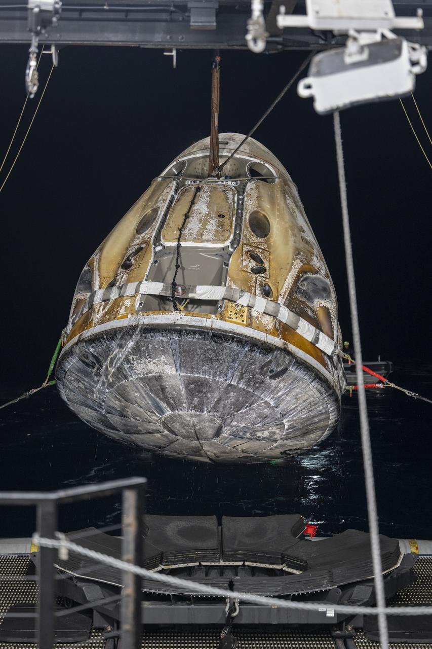 Support teams raise the SpaceX Dragon Endurance spacecraft onto the SpaceX recovery ship Shannon shortly after it landed with with NASA astronauts Nicole Mann and Josh Cassada, Japan Aerospace Exploration Agency (JAXA) astronaut Koichi Wakata, and Roscosmos cosmonaut Anna Kikina onboard in the Gulf of Mexico off the coast of Tampa, Florida, Saturday, March 11, 2023. Mann, Cassada, Wakata, and Kikina are returning after 157 days in space as part of Expedition 68 aboard the International Space Station. Photo Credit: (NASA/Keegan Barber).