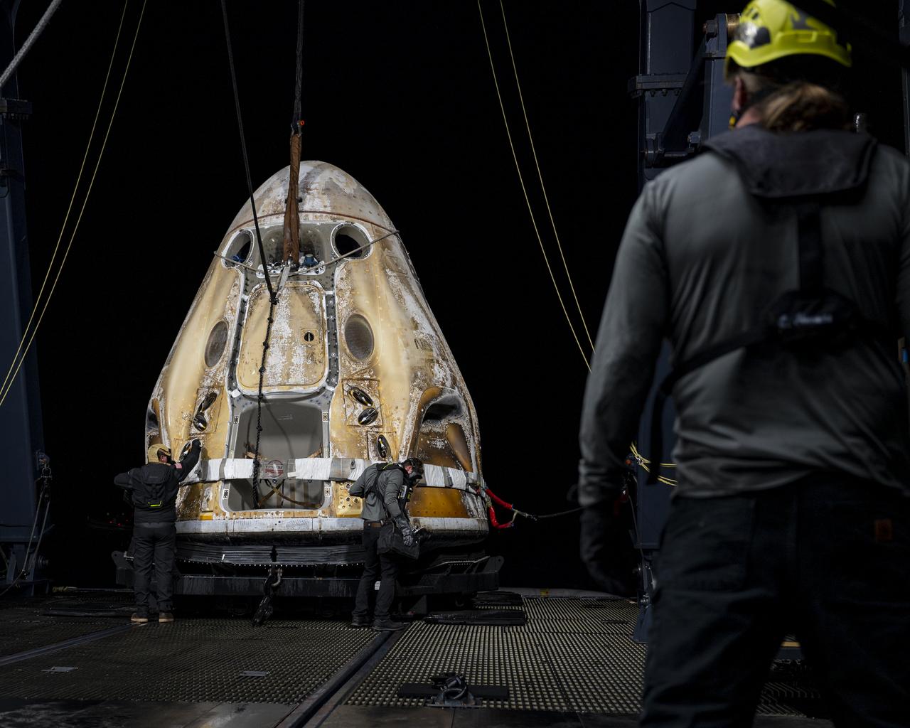Support teams onboard the SpaceX recovery ship Shannon work around the SpaceX Dragon Endurance spacecraft shortly after it landed with with NASA astronauts Nicole Mann and Josh Cassada, Japan Aerospace Exploration Agency (JAXA) astronaut Koichi Wakata, and Roscosmos cosmonaut Anna Kikina onboard in the Gulf of Mexico off the coast of Tampa, Florida, Saturday, March 11, 2023. Mann, Cassada, Wakata, and Kikina are returning after 157 days in space as part of Expedition 68 aboard the International Space Station. Photo Credit: (NASA/Keegan Barber).