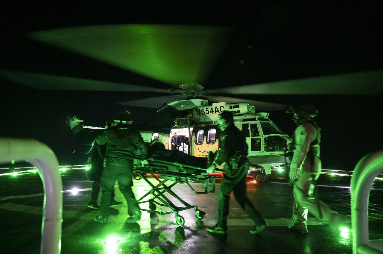 NASA Astronaut Josh Cassada is helped onto a helicopter onboard the SpaceX recovery ship Shannon shortly after he, along with NASA astronaut Nicole Mann, Roscosmos cosmonaut Anna Kikina, and Japan Aerospace Exploration Agency (JAXA) astronaut Koichi Wakata, landed while onboard SpaceX Dragon Endeavor spacecraft in the Gulf of Mexico off the coast of Tampa, Florida, Saturday, March 11, 2023. Mann, Cassada, Wakata, and Kikina are returning after 157 days in space as part of Expedition 68 aboard the International Space Station. Photo Credit: (NASA/Keegan Barber).