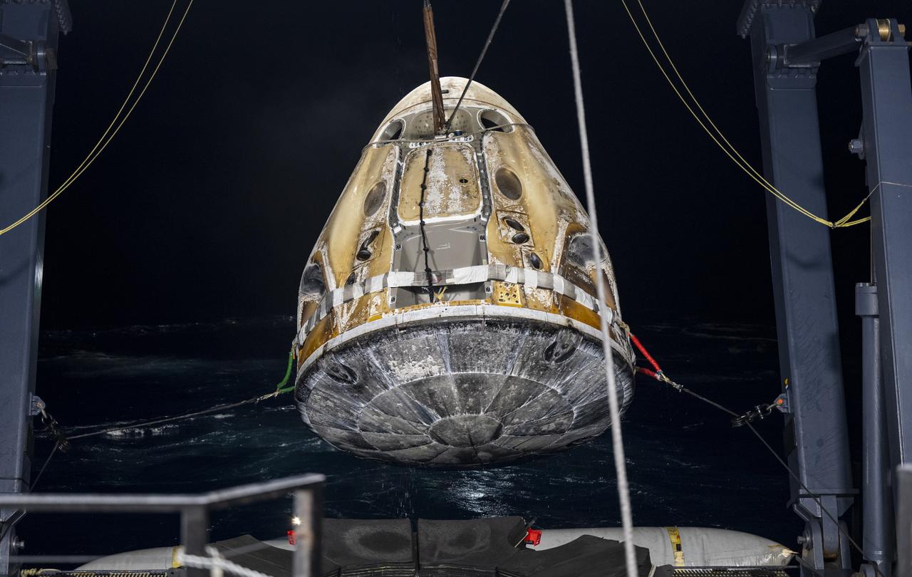 Support teams raise the SpaceX Dragon Endurance spacecraft onto the SpaceX recovery ship Shannon shortly after it landed with with NASA astronauts Nicole Mann and Josh Cassada, Japan Aerospace Exploration Agency (JAXA) astronaut Koichi Wakata, and Roscosmos cosmonaut Anna Kikina onboard in the Gulf of Mexico off the coast of Tampa, Florida, Saturday, March 11, 2023. Mann, Cassada, Wakata, and Kikina are returning after 157 days in space as part of Expedition 68 aboard the International Space Station. Photo Credit: (NASA/Keegan Barber).