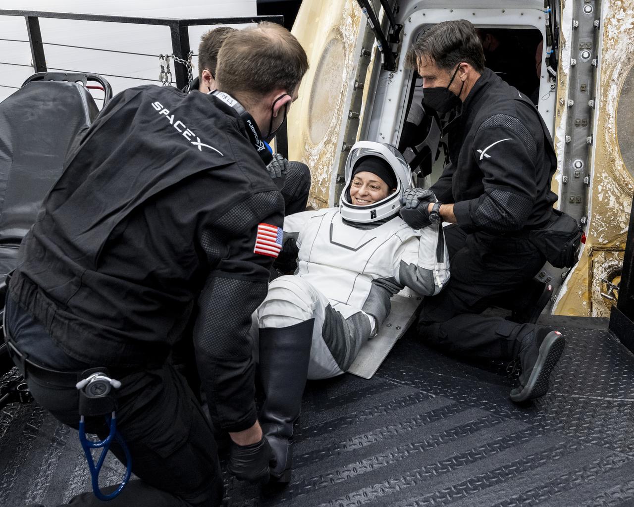 NASA Astronaut Nicole Mann is helped out of the SpaceX Dragon Endurance spacecraft onboard the SpaceX recovery ship Shannon shortly after she, along with NASA astronaut Josh Cassada, Roscosmos cosmonaut Anna Kikina, and Japan Aerospace Exploration Agency (JAXA) astronaut Koichi Wakata, landed in the Gulf of Mexico off the coast of Tampa, Florida, Saturday, March 11, 2023. Mann, Cassada, Wakata, and Kikina are returning after 157 days in space as part of Expedition 68 aboard the International Space Station. Photo Credit: (NASA/Keegan Barber).