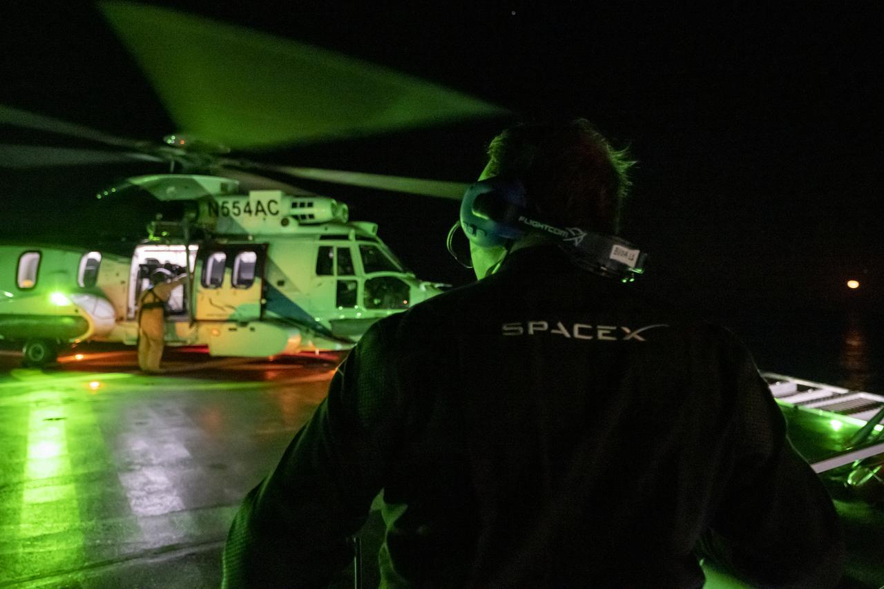 NASA Astronaut Josh Cassada is helped onto a helicopter onboard the SpaceX recovery ship Shannon shortly after he, along with NASA astronaut Nicole Mann, Roscosmos cosmonaut Anna Kikina, and Japan Aerospace Exploration Agency (JAXA) astronaut Koichi Wakata, landed while onboard SpaceX Dragon Endeavor spacecraft in the Gulf of Mexico off the coast of Tampa, Florida, Saturday, March 11, 2023. Mann, Cassada, Wakata, and Kikina are returning after 157 days in space as part of Expedition 68 aboard the International Space Station. Photo Credit: (NASA/Keegan Barber).