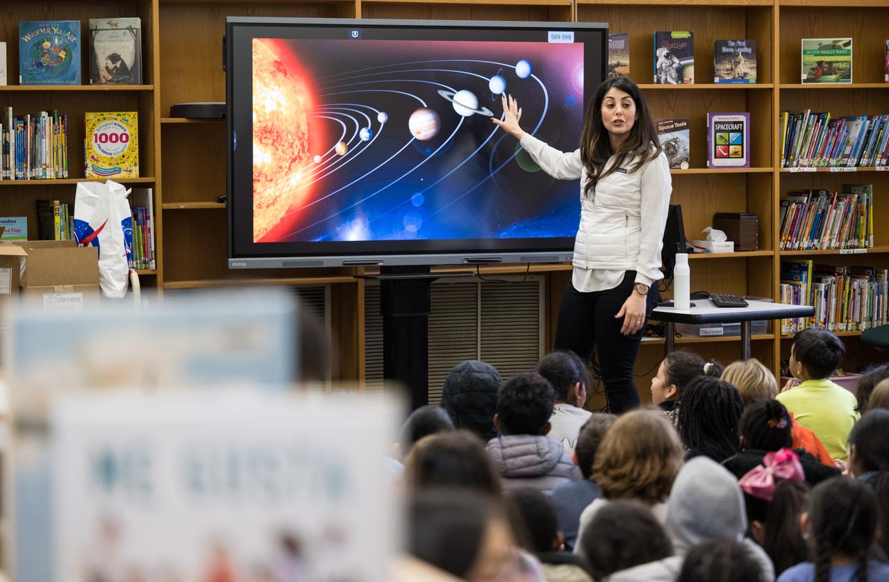 NASA Technical Group Supervisor for Sequence Planning and Execution and Tactical Mission Lead for the Mars Perseverance rover, Diana Trujillo, speaks to students at Rolling Terrace Elementary School, Monday, March 13, 2023, in Takoma Park, Maryland. Photo Credit: (NASA/Aubrey Gemignani)