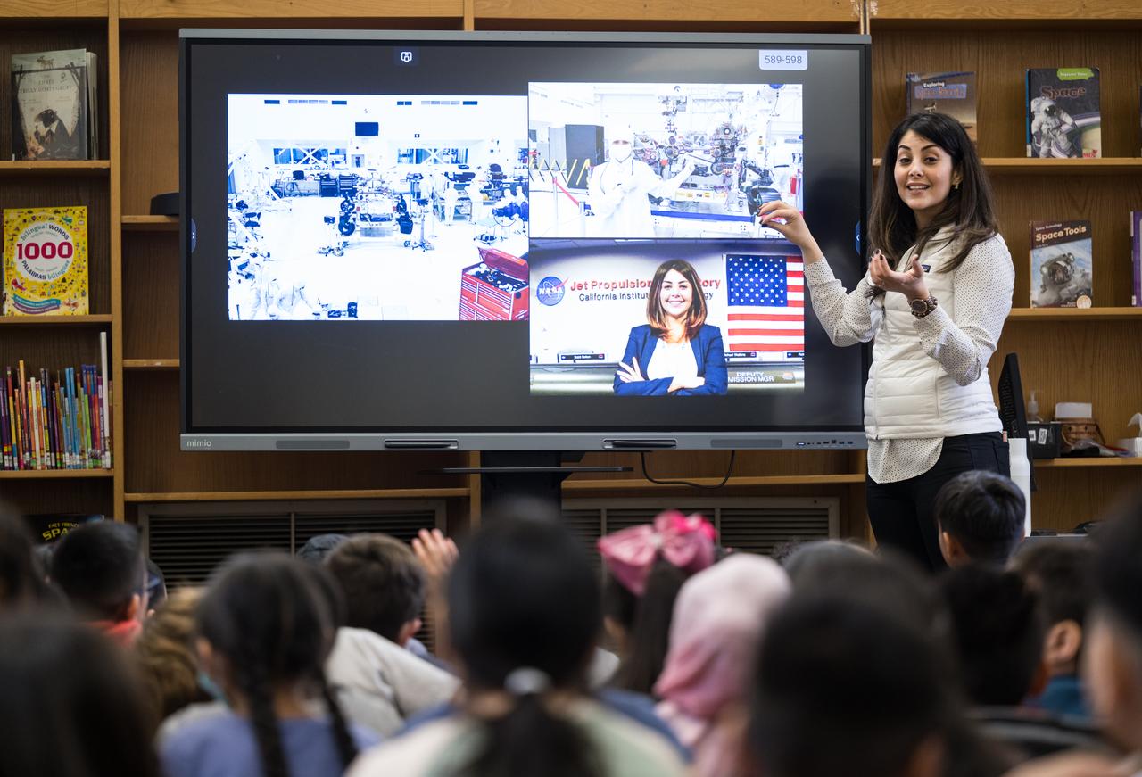 NASA Technical Group Supervisor for Sequence Planning and Execution and Tactical Mission Lead for the Mars Perseverance rover, Diana Trujillo, speaks to students at Rolling Terrace Elementary School, Monday, March 13, 2023, in Takoma Park, Maryland. Photo Credit: (NASA/Aubrey Gemignani)