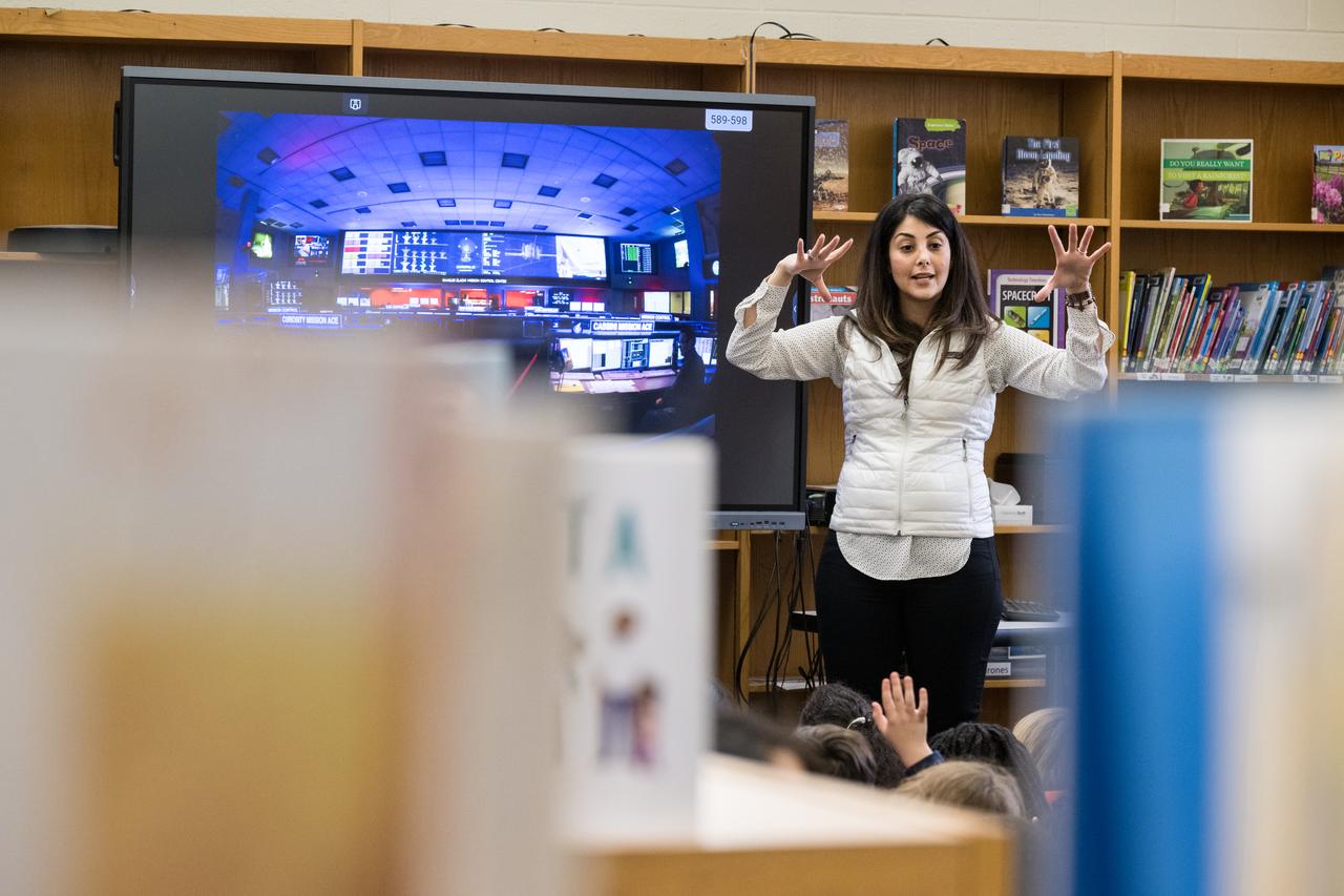 NASA Technical Group Supervisor for Sequence Planning and Execution and Tactical Mission Lead for the Mars Perseverance rover, Diana Trujillo, speaks to students at Rolling Terrace Elementary School, Monday, March 13, 2023, in Takoma Park, Maryland. Photo Credit: (NASA/Aubrey Gemignani)