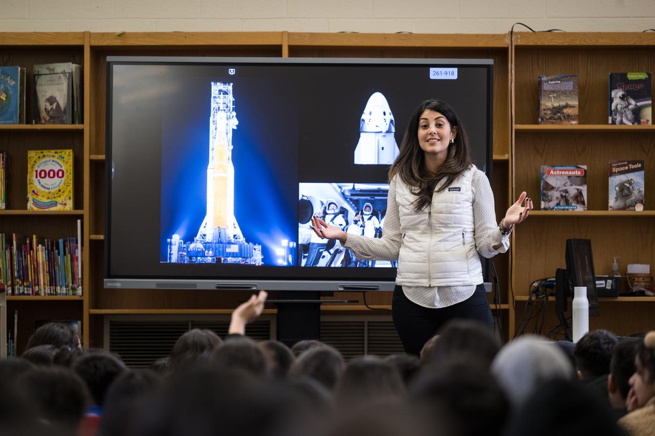 NASA Technical Group Supervisor for Sequence Planning and Execution and Tactical Mission Lead for the Mars Perseverance rover, Diana Trujillo, speaks to students at Rolling Terrace Elementary School, Monday, March 13, 2023, in Takoma Park, Maryland. Photo Credit: (NASA/Aubrey Gemignani)