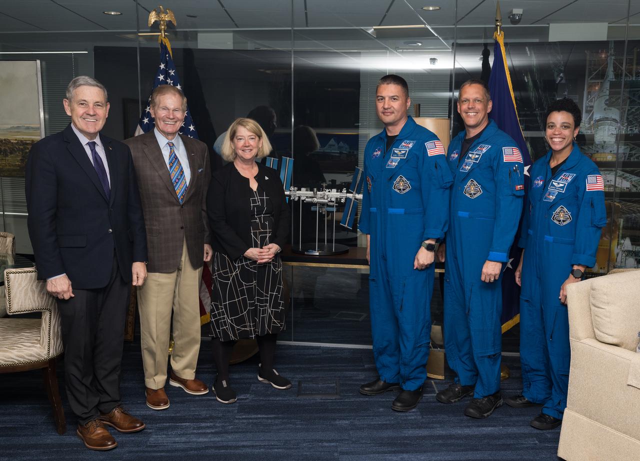 From left to right, NASA Associate Administrator Bob Cabana, NASA Administrator, Bill Nelson, and NASA Deputy Administrator, Pam Melroy, pose for a photo with NASA’s SpaceX Crew-4 NASA astronauts Kjell Lindgren, Robert Hines, and Jessica Watkins, Monday, March 27, 2023, at the Mary W. Jackson NASA Headquarters building in Washington DC. Photo Credit: (NASA/Aubrey Gemignani)