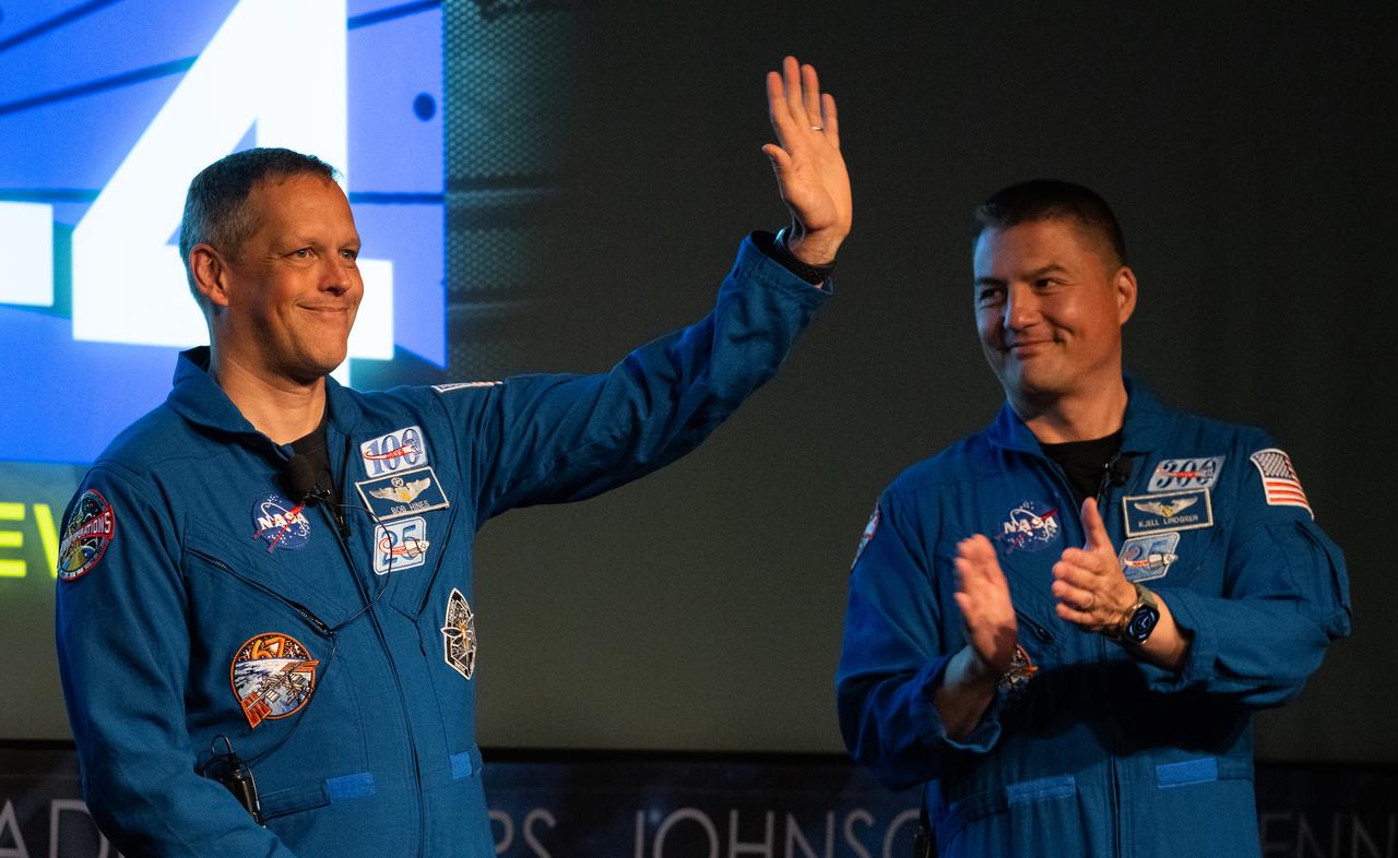 NASA astronauts Robert Hines, left, and Kjell Lindgren are seen at an employee engagement event, Tuesday, March 28, 2023, at the Mary W. Jackson NASA Headquarters building in Washington. Lindgren, Hines and NASA astronaut Jessica Watkins spent 170 days in space as part of Expeditions 67 and 68 aboard the International Space Station.  Photo Credit: (NASA/Joel Kowsky)