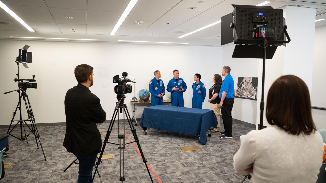 NASA astronauts Robert Hines, left, Kjell Lindgren, second from left, and Jessica Watkins, center, speak with Beth Wilson, second from right and Marty Kelsey, right, while taping a segment for STEM in 30, Tuesday, March 28, 2023 at the Smithsonian’s National Air and Space Museum in Washington. Lindgren, Hines, and Watkins spent 170 days in space as part of Expeditions 67 and 68 aboard the International Space Station. Photo Credit: (NASA/Joel Kowsky)