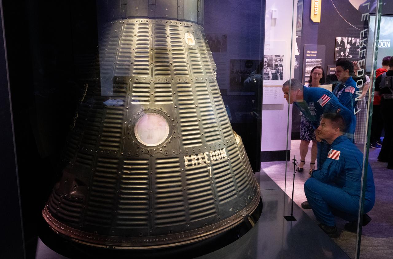 NASA astronauts Kjell Lindgren, Robert Hines, and Jessica Watkins and Smithsonian National Air and Space Museum curator Jennifer Levasseur are seen as they view the Freedom 7 Mercury capsule in the Destination Moon exhibit during a tour, Tuesday, March 28, 2023 at the Smithsonian’s National Air and Space Museum in Washington. Lindgren, Hines, and Watkins spent 170 days in space as part of Expeditions 67 and 68 aboard the International Space Station. Photo Credit: (NASA/Joel Kowsky)