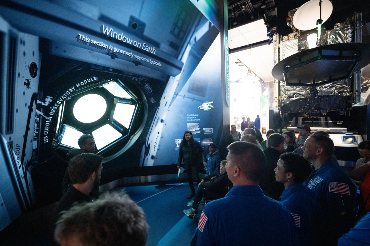 NASA astronauts Kjell Lindgren, Jessica Watkins, and Robert Hines are seen in the in the One World Connected gallery looking at an interactive recreation of the International Space Station’s Cupola, Tuesday, March 28, 2023 at the Smithsonian’s National Air and Space Museum in Washington. Lindgren, Watkins, and Hines spent 170 days in space as part of Expeditions 67 and 68 aboard the International Space Station. Photo Credit: (NASA/Joel Kowsky)