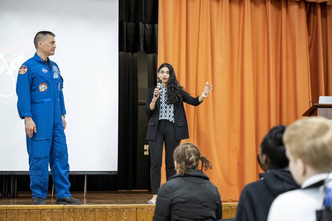 NASA astronaut Kjell Lindgren, left, and NASA Associate Chief Scientist for Exploration and Applied Research in the Office of the Chief Scientist Dr. Mamta Patel Nagaraja, right, answer questions from students during a STEM event at DuVal High School, Thursday, March 30, 2023, in Lanham, Maryland. Lindgren spent 170 days in space as part of Expeditions 67 and 68 aboard the International Space Station. Photo Credit: (NASA/Keegan Barber)
