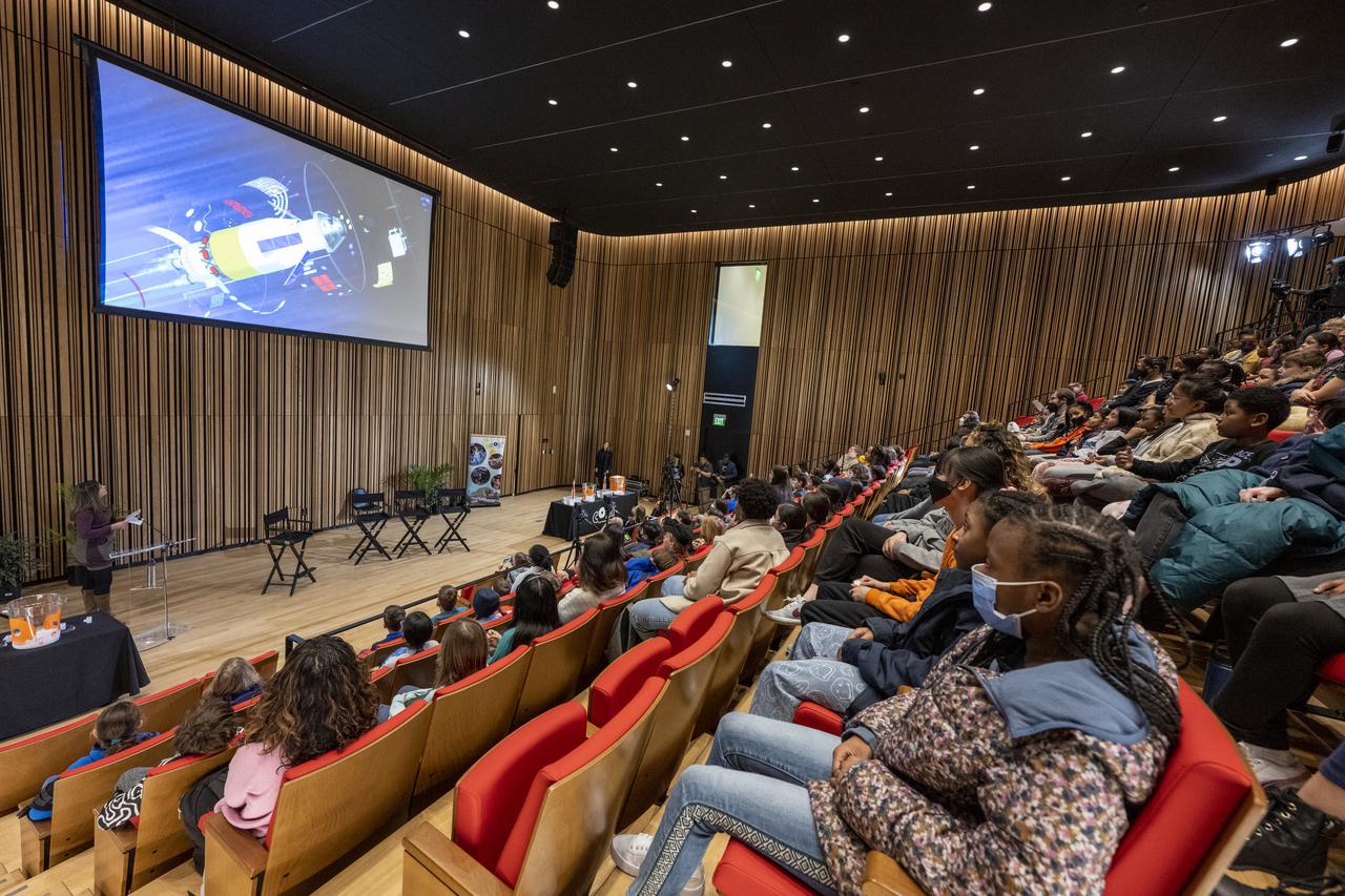 Local students watch a video presentation during an event with NASA astronauts Jessica Watkins, Kjell Lindgren, and Robert Hines at the Martin Luther King Jr Memorial Library, Thursday, March 30, 2023, in Washington. Lindgren, Hines, and Watkins spent 170 days in space as part of Expeditions 67 and 68 aboard the International Space Station.  Photo Credit: (NASA/Keegan Barber)