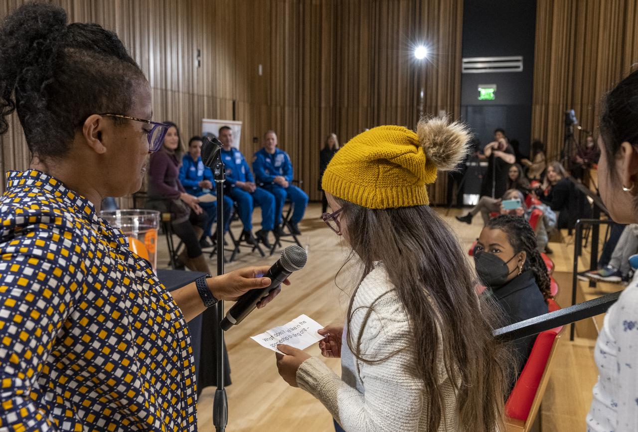 NASA astronauts Jessica Watkins, left, Kjell Lindgren, center, and Robert Hines, right, answer questions from students during an event at the Martin Luther King Jr Memorial Library, Thursday, March 30, 2023, in Washington. Lindgren, Hines, and Watkins spent 170 days in space as part of Expeditions 67 and 68 aboard the International Space Station.  Photo Credit: (NASA/Keegan Barber)