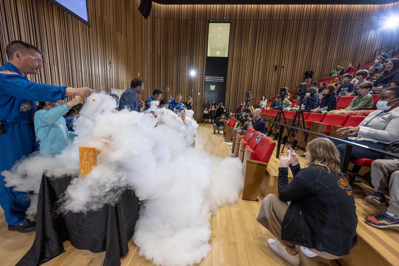 NASA astronauts Kjell Lindgren, Jessica Watkins, and Robert Hines participate in STEM demonstrations with local students at the Martin Luther King Jr Memorial Library, Thursday, March 30, 2023, in Washington. Lindgren, Hines, and Watkins spent 170 days in space as part of Expeditions 67 and 68 aboard the International Space Station. Photo Credit: (NASA/Keegan Barber)