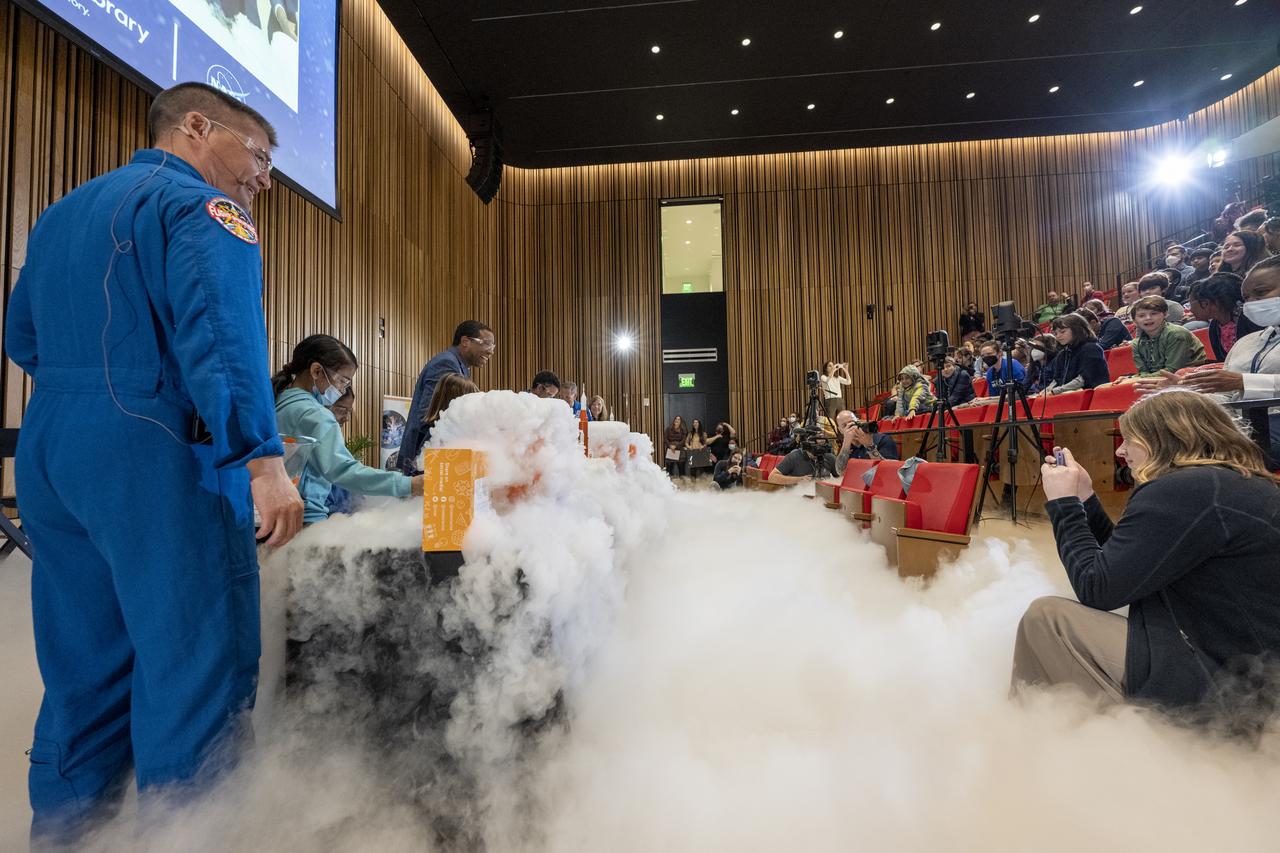 NASA astronauts Kjell Lindgren, Jessica Watkins, and Robert Hines participate in STEM demonstrations with local students at the Martin Luther King Jr Memorial Library, Thursday, March 30, 2023, in Washington. Lindgren, Hines, and Watkins spent 170 days in space as part of Expeditions 67 and 68 aboard the International Space Station.  Photo Credit: (NASA/Keegan Barber)