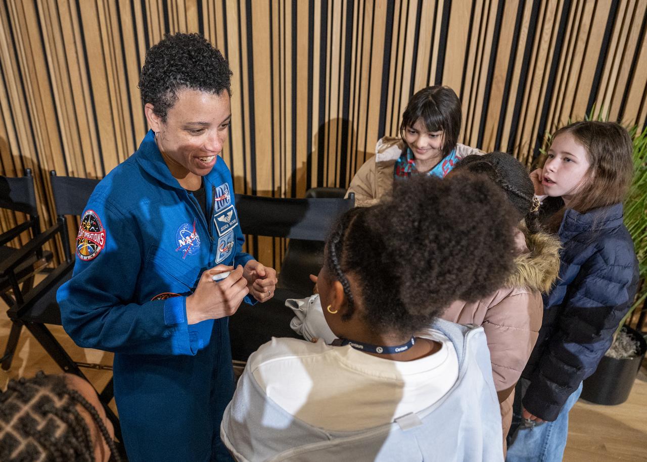 NASA astronaut Jessica Watkins signs autographs for local students following an event at the Martin Luther King Jr Memorial Library, Thursday, March 30, 2023, in Washington. Lindgren, Hines, and Watkins spent 170 days in space as part of Expeditions 67 and 68 aboard the International Space Station.  Photo Credit: (NASA/Keegan Barber)