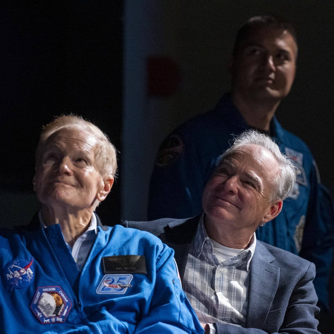 From left to right, NASA Administrator Bill Nelson, Senator Tim Kaine (D-Va.), and NASA Astronaut Kjell Lindgren view a video presentation during a STEM event at James W. Robinson Secondary School, Friday, March 31, 2023, in Fairfax, Virginia. Lindgren spent 170 days in space as part of Expeditions 67 and 68 aboard the International Space Station. Photo Credit: (NASA/Keegan Barber)