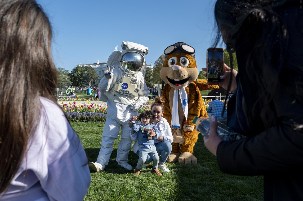 Spacey Casey, left, and NASA Aeronautics' mascot Orville the Flying Squirrel, right, pose for photos with guests during the White House Easter Egg Roll, Monday, April 10, 2023, on the South Lawn of the White House in Washington. Photo Credit: (NASA/Keegan Barber)