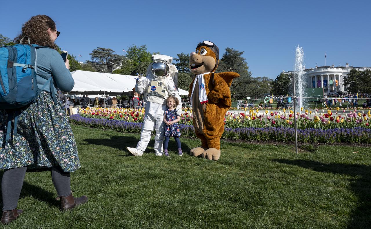 Spacey Casey, left, and NASA Aeronautics' mascot Orville the Flying Squirrel, right, pose for photos with guests during the White House Easter Egg Roll, Monday, April 10, 2023, on the South Lawn of the White House in Washington. Photo Credit: (NASA/Keegan Barber)