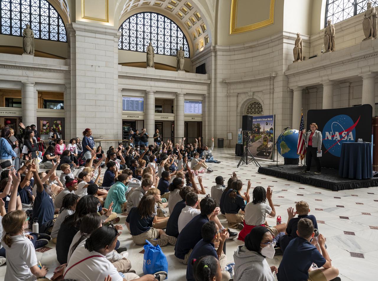 Earth Science Division Deputy Director Julie Robinson speaks with local students during an Earth Day event, Thursday, April 20, 2023, at Union Station in Washington.  Photo Credit: (NASA/Keegan Barber)
