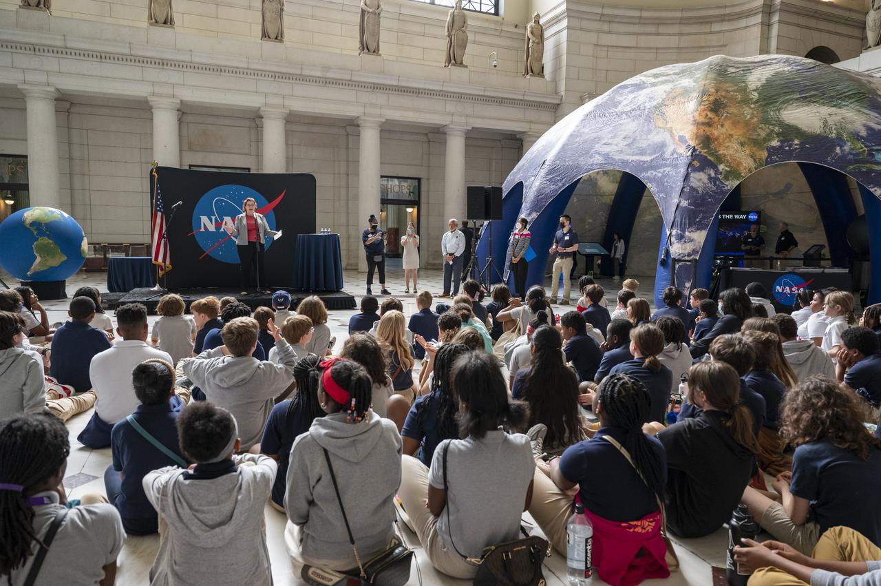 Earth Science Division Deputy Director Julie Robinson speaks with local students during an Earth Day event, Thursday, April 20, 2023, at Union Station in Washington.  Photo Credit: (NASA/Keegan Barber)