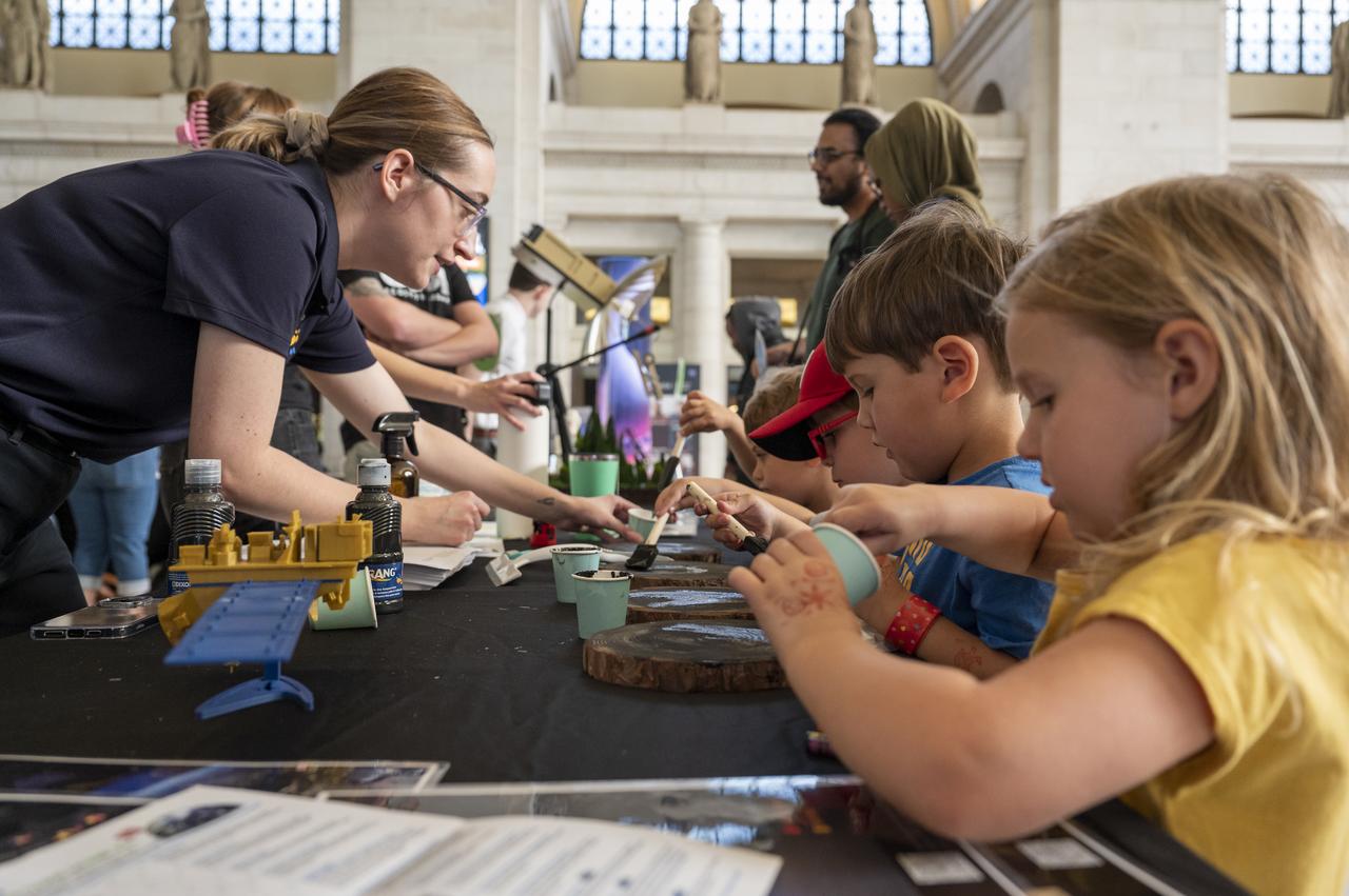 Visitors explore NASA’s hands-on exhibits during an Earth Day event, Thursday, April 20, 2023, at Union Station in Washington.  Photo Credit: (NASA/Keegan Barber)