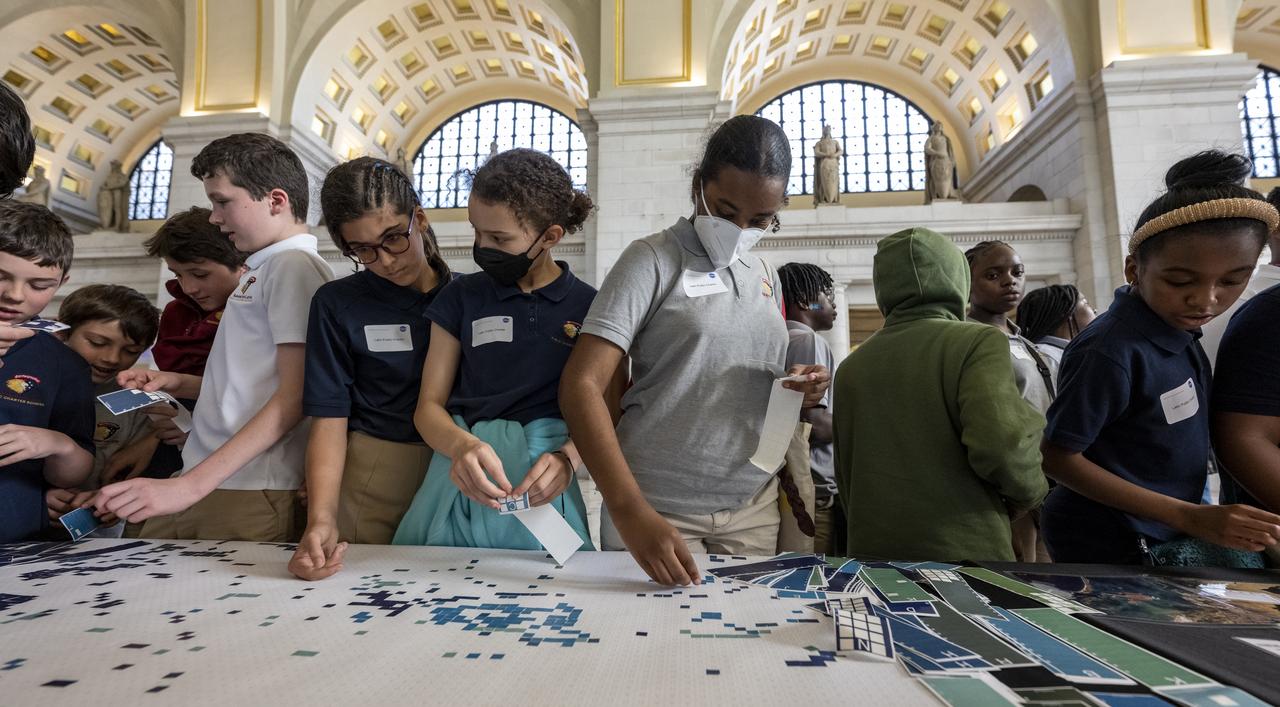 Visitors explore NASA’s hands-on exhibits during an Earth Day event, Thursday, April 20, 2023, at Union Station in Washington.  Photo Credit: (NASA/Keegan Barber)