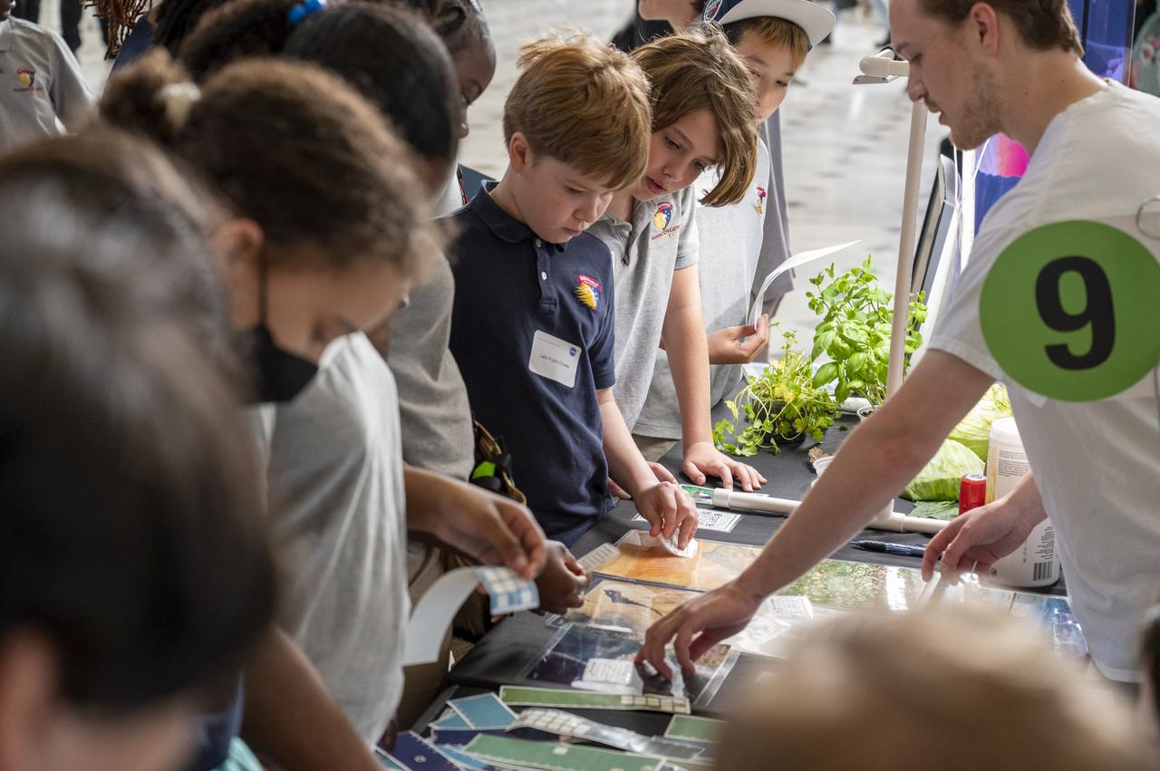 Visitors explore NASA’s hands-on exhibits during an Earth Day event, Thursday, April 20, 2023, at Union Station in Washington.  Photo Credit: (NASA/Keegan Barber)