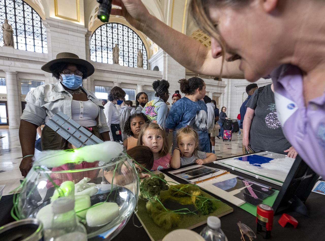 Visitors explore NASA’s hands-on exhibits during an Earth Day event, Thursday, April 20, 2023, at Union Station in Washington.  Photo Credit: (NASA/Keegan Barber)