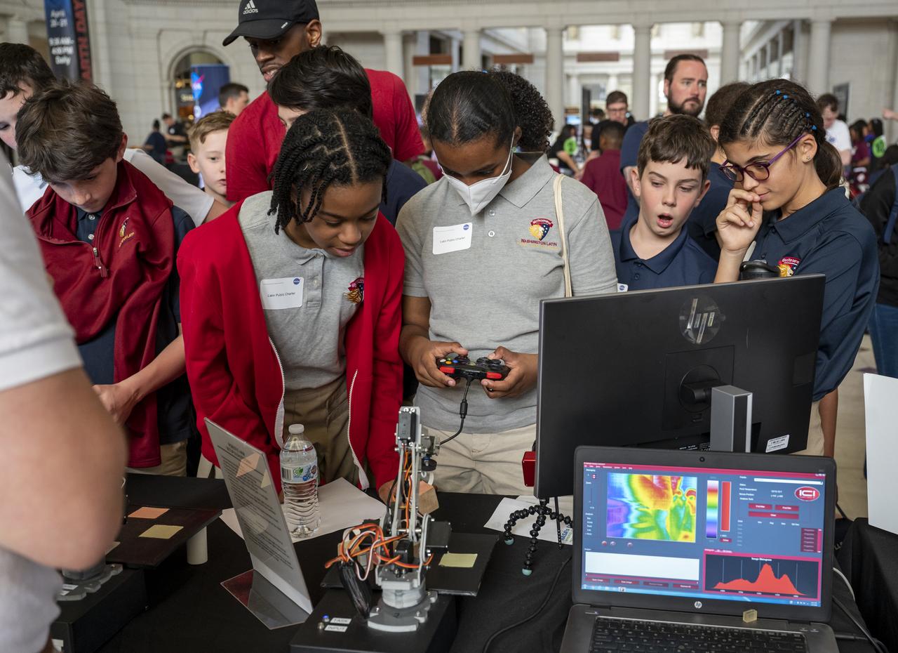 Visitors explore NASA’s hands-on exhibits during an Earth Day event, Thursday, April 20, 2023, at Union Station in Washington.  Photo Credit: (NASA/Keegan Barber)