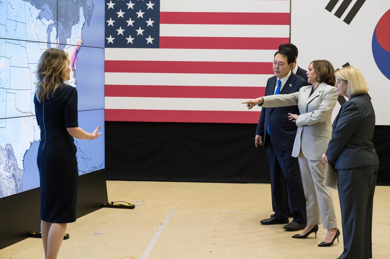 Dr. Lesley Ott, research meteorologist and climate scientist at NASA’s Goddard Space Flight Center briefs from left to right, President Yoon Suk Yeol of the Republic of Korea, Vice President Kamala Harris, and NASA Deputy Administrator Pam Melroy on U.S. and Korean partnerships to improve the way scientists observe air quality and the use of space in addressing the climate crisis, Tuesday, April 25, 2023, during a tour of NASA’s Goddard Space Flight Center in Greenbelt, Md.  Photo Credit: (NASA/Aubrey Gemignani)