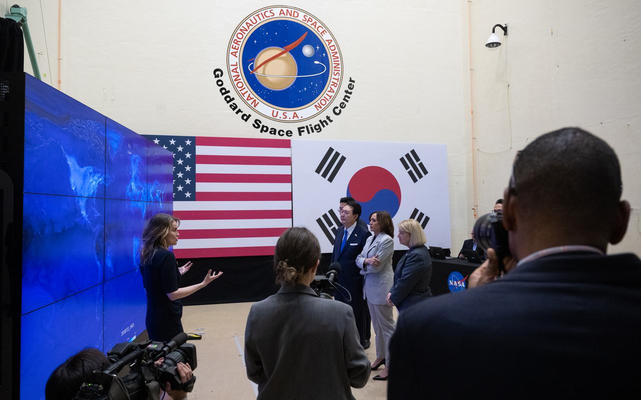 Dr. Lesley Ott, research meteorologist and climate scientist at NASA’s Goddard Space Flight Center, left, briefs Vice President Kamala Harris, President Yoon Suk Yeol of the Republic of Korea, and NASA Deputy Administrator Pam Melroy, on U.S. and Korean partnerships to improve the way scientists observe air quality and the use of space in addressing the climate crisis, Tuesday, April 25, 2023, during a tour of NASA’s Goddard Space Flight Center in Greenbelt, Md.  Photo Credit: (NASA/Joel Kowsky)