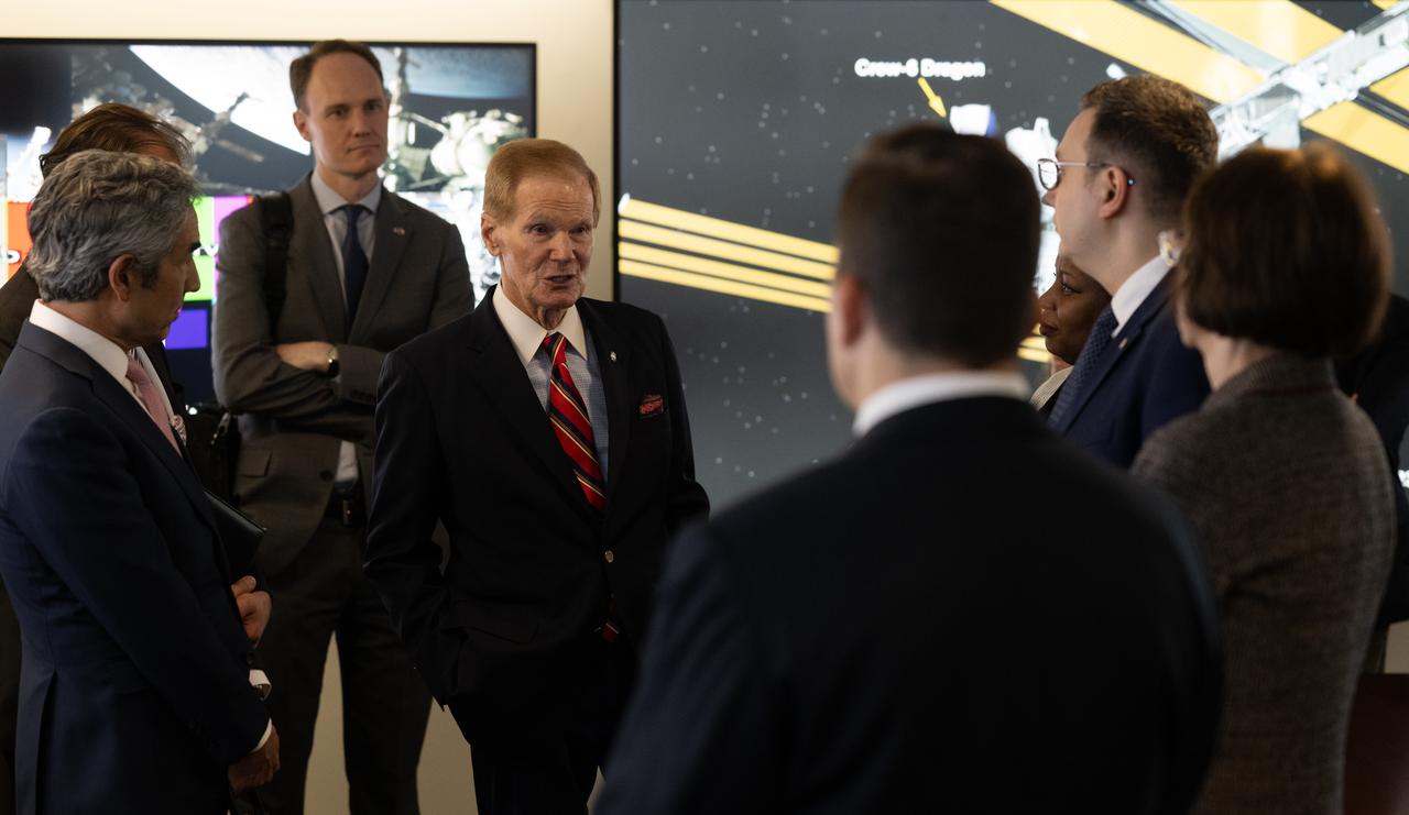 NASA Administrator Bill Nelson, center, speaks with Miloslav Stašek, Ambassador of the Czech Republic to the United States, Foreign Affairs Minister for the Czech Republic, Jan Lipavský, and Acting Assistant Secretary of State for Oceans and International Environmental and Scientific Affairs Jennifer R. Littlejohn, in the Space Operations Center following the signing of the Artemis Accords, Wednesday, May 3, 2023, at The Mary W. Jackson NASA Headquarters building in Washington DC. The Czech Republic is the twenty fourth country to sign the Artemis Accords, which establish a practical set of principles to guide space exploration cooperation among nations participating in NASA’s Artemis program. Photo Credit: (NASA/Joel Kowsky)