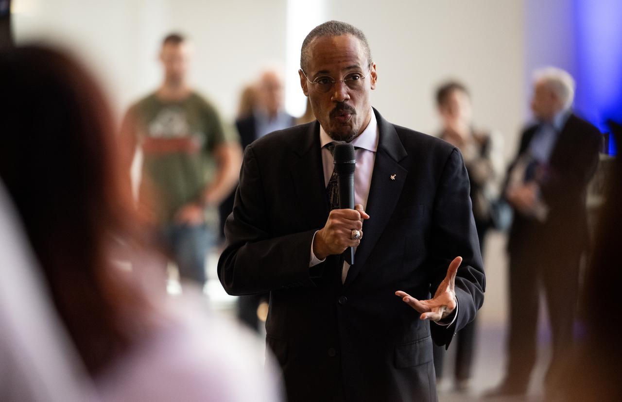 NASA astronaut Alvin Drew answers question prior to the world premier performance of Henry Dehlinger’s “Cosmic Cycles,” Thursday, May 11, 2023, at Capital One Hall in Tysons, Va. “Cosmic Cycles: A Space Symphony” is a collaboration between composer Henry Dehlinger, NASA’s Goddard Space Flight Center, and the National Philharmonic that features a fusion of music and video in seven multimedia works on the Sun, Earth, Moon, Planets, and Cosmos.  Photo Credit: (NASA/Joel Kowsky)
