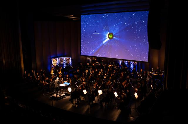 NASA image: National Philharmonic Performs Cosmic Cycles: A Space Symphony
